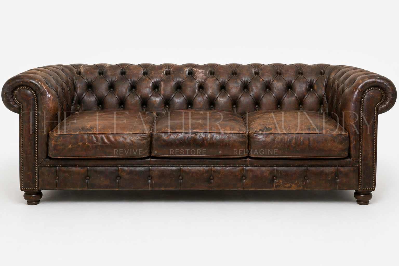 Leather sofa before recolouring — peeling and colour loss
